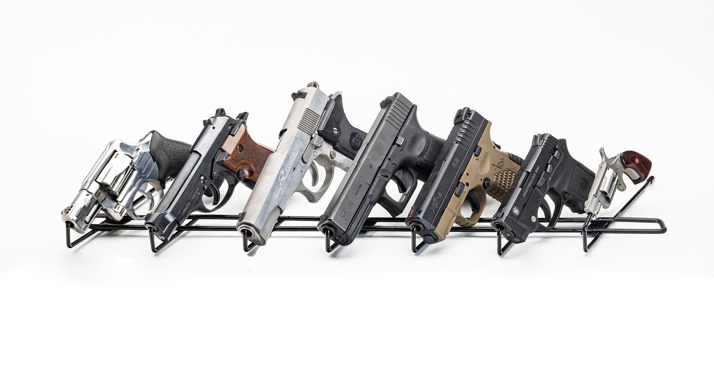 7 Pistol Display, Rod in the Barrel Pistol Display. (SKU: 6063)